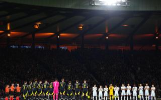 Both teams joined with the Tartan Army in the one-minute applause for Alex Salmond