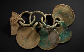 A bronze rattle pendant from the Peebles Hoard which dates from 1000-800 BCE