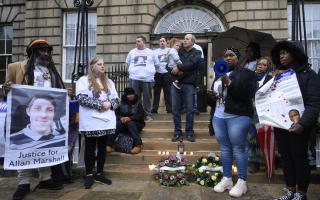 Families and supporters of Sheku Bayoh and Allan Marshall hold a remembrance vigil in 2022