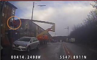 CCTV footage showing a roofer who was thrown from a cherry picker in the Castlemilk area of Glasgow