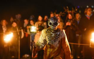 Members of the Beltane Fire Society take part in Samhuinn Fire Festival on October 31 in Edinburgh