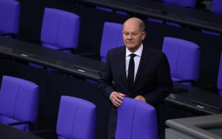 German Chancellor Olaf Scholz attends a session of the Bundestag in which new Finance Minister Joerg Kukies was sworn in the day after Scholz fired previous Finance Minister Christian Lindner