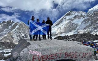 The Burton family, from Musselburgh, celebrate reaching Everest base camp