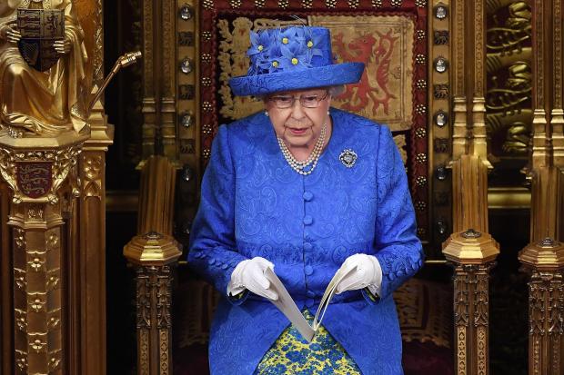 The National: Queen Elizabeth II reading the Queen's Speech in the House of Lords for the State Opening of Parliament. Photograph: Carl Court/PA Wire.